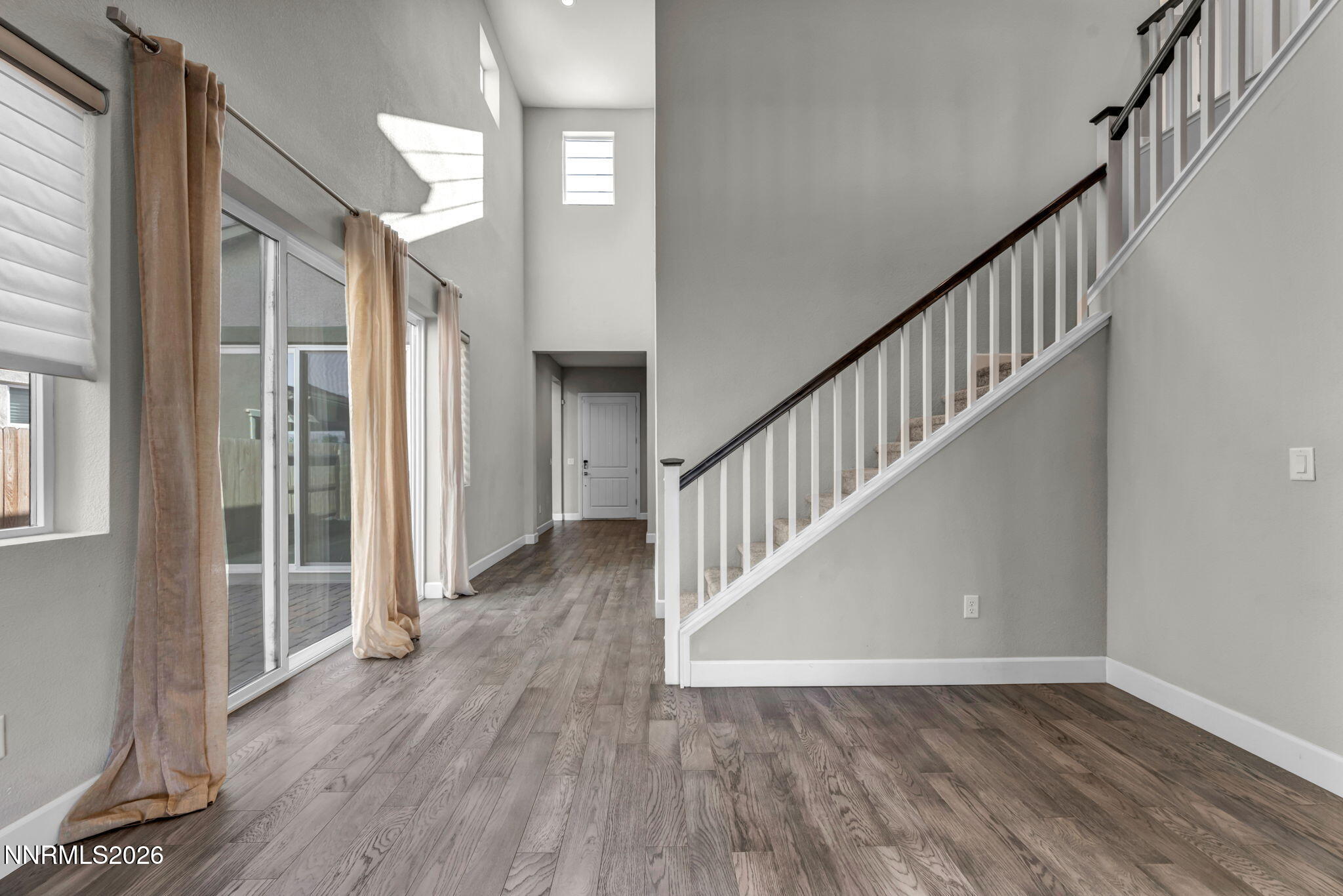 9267 Blue Basin Trail Reno, NV 89521 - Photo 6 of 95 a view of an entryway with wooden floor
