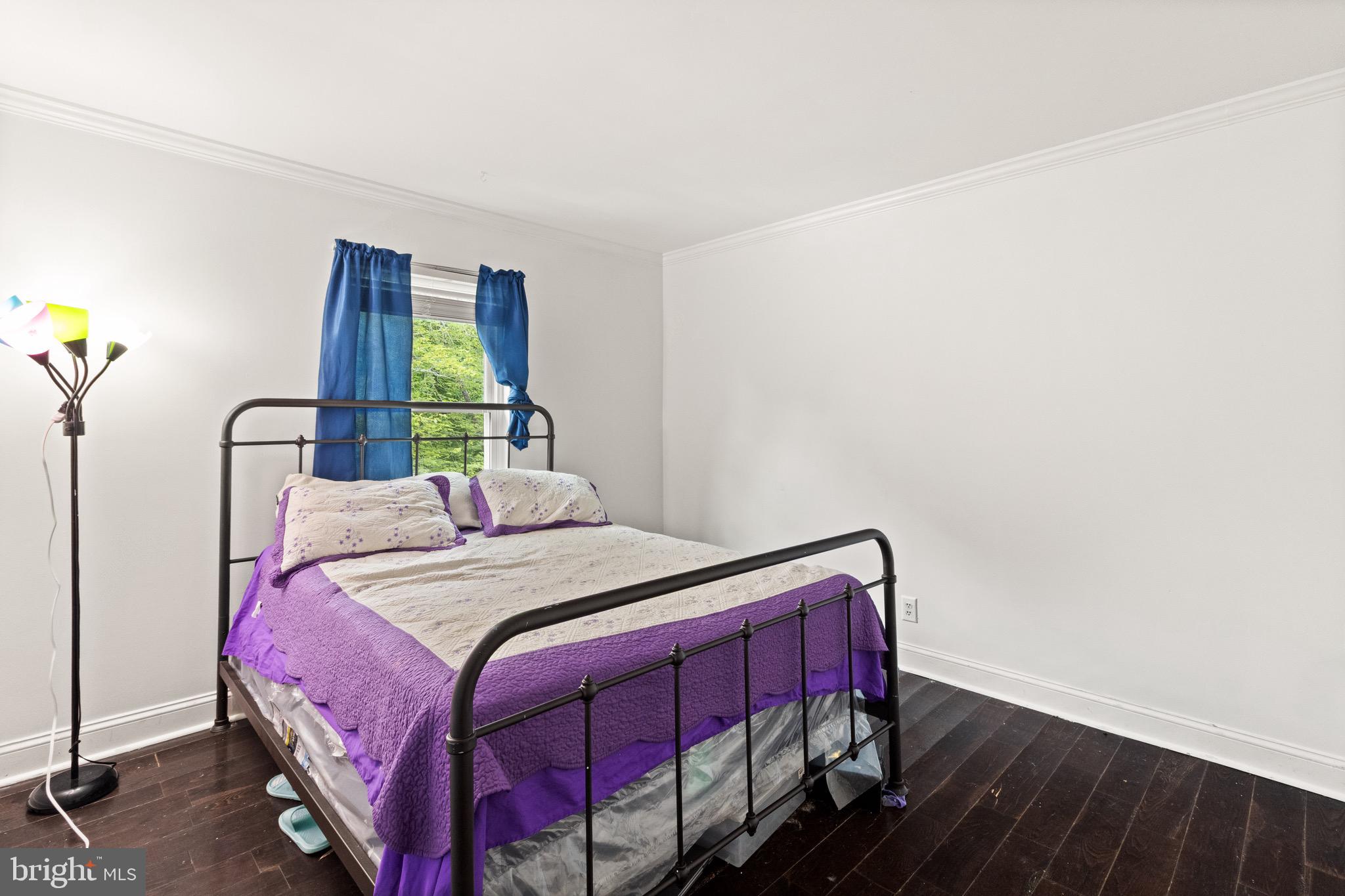 244 Raintree Boulevard Stafford, VA 22556 - Photo 22 of 34 a bedroom with a bed and a mirror