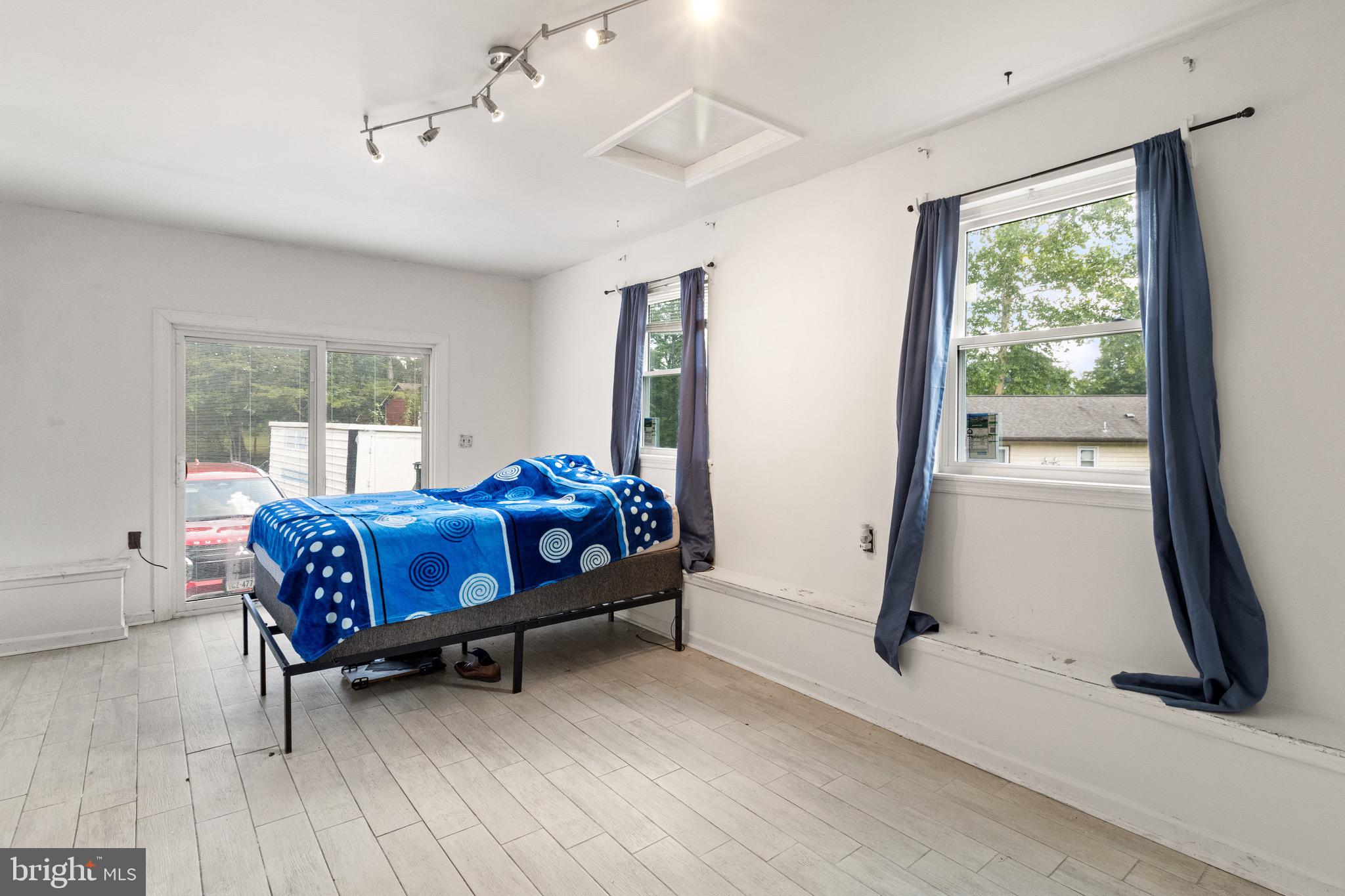 244 Raintree Boulevard Stafford, VA 22556 - Photo 25 of 34 a spacious bedroom with a bed and a window