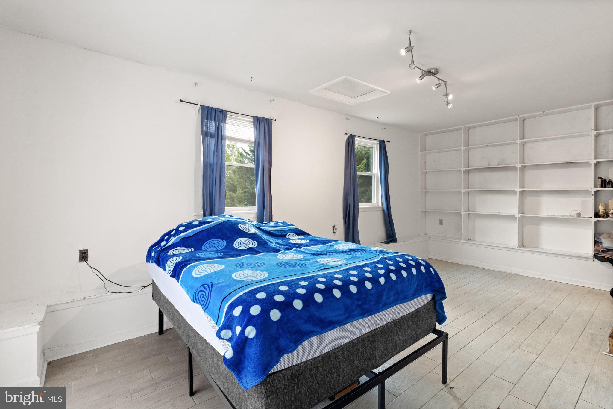 244 Raintree Boulevard Stafford, VA 22556 - Photo 26 of 34 a bedroom with a bed and a window