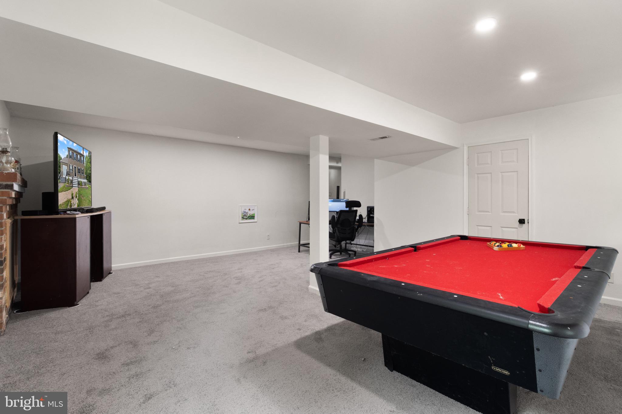244 Raintree Boulevard Stafford, VA 22556 - Photo 29 of 34 a room with pool table and windows