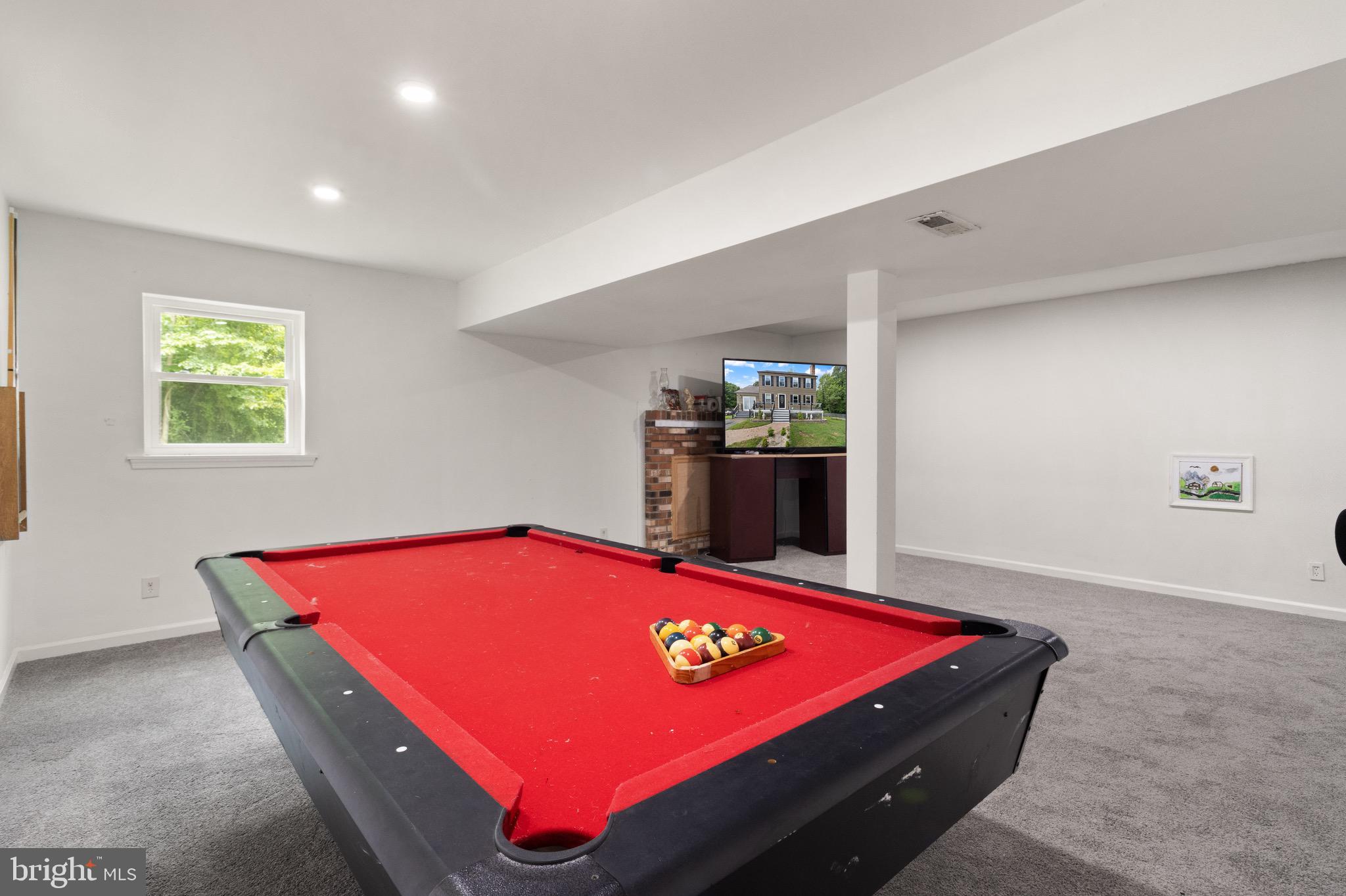 244 Raintree Boulevard Stafford, VA 22556 - Photo 30 of 34 a room with pool table and windows