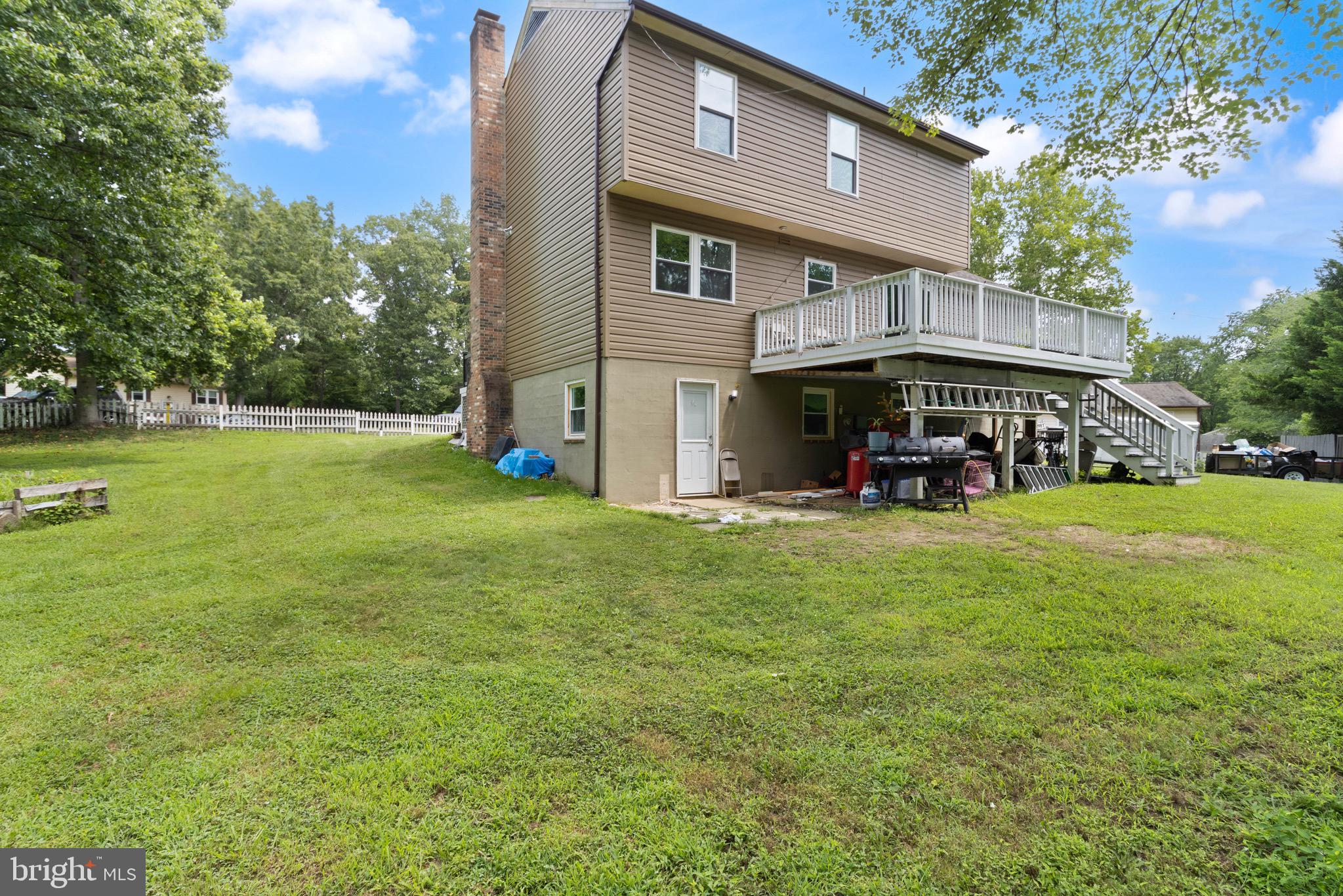 244 Raintree Boulevard Stafford, VA 22556 - Photo 32 of 34 a view of house with outdoor space and garden