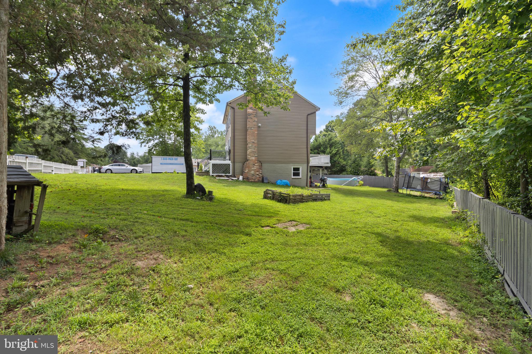 244 Raintree Boulevard Stafford, VA 22556 - Photo 34 of 34 a view of a park with large trees