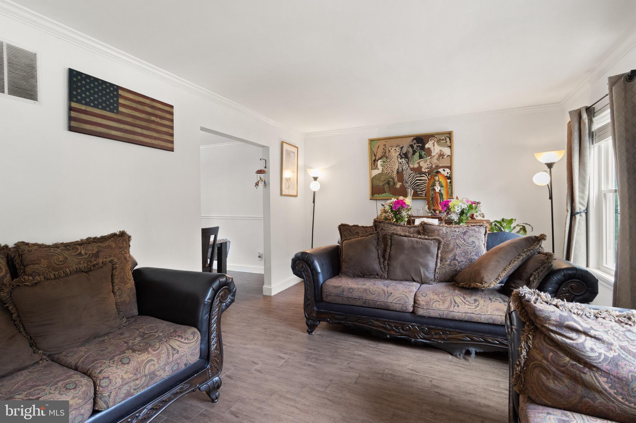 244 Raintree Boulevard Stafford, VA 22556 - Photo 4 of 34 a living room with furniture and a window