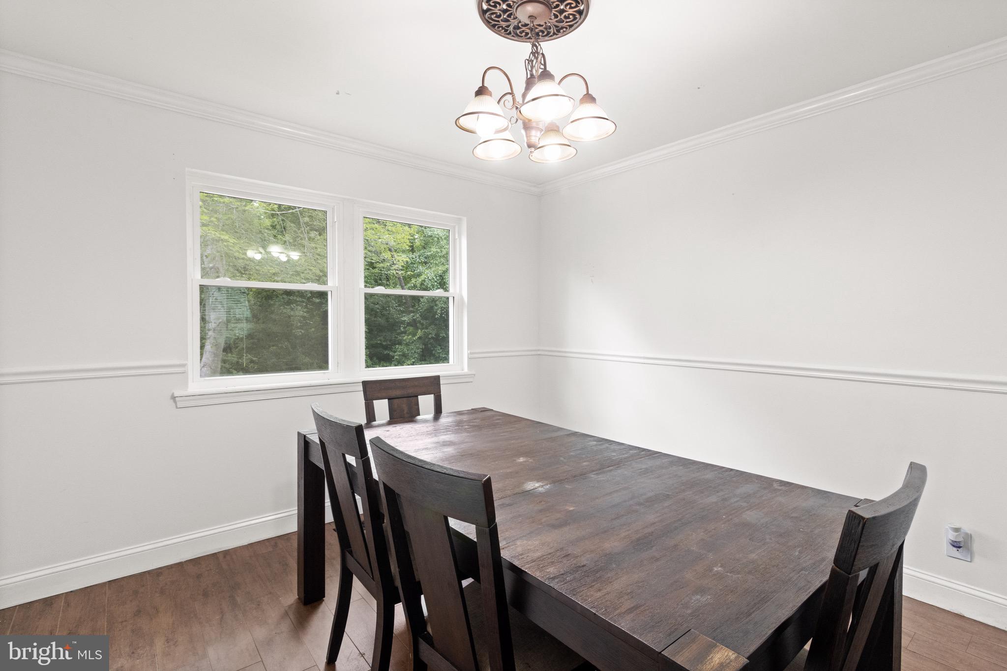 244 Raintree Boulevard Stafford, VA 22556 - Photo 9 of 34 a view of a dining room with furniture window and outside view