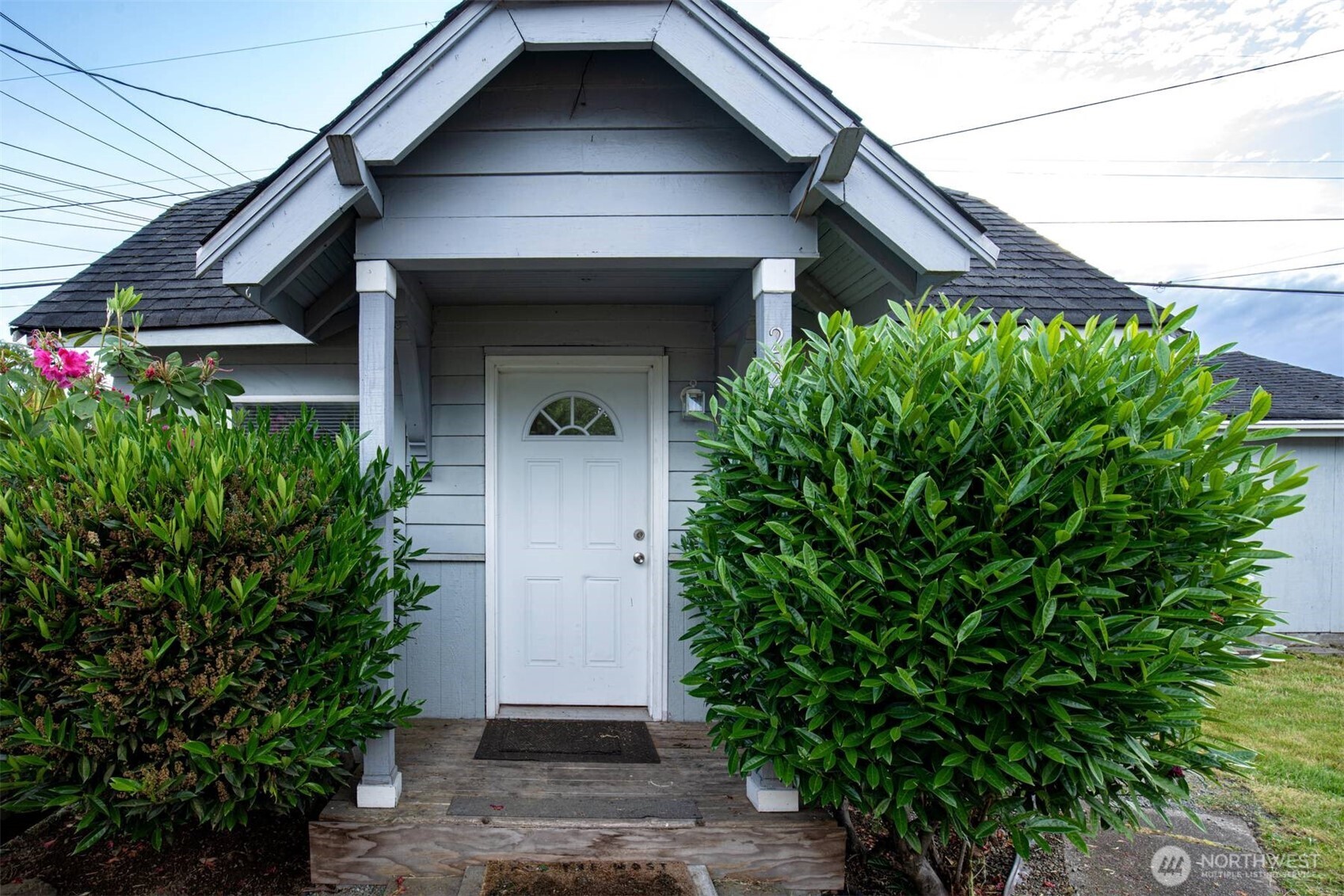 2220 Summit Avenue Everett, WA 98201 - Photo 2 of 26 a front view of a house with garden