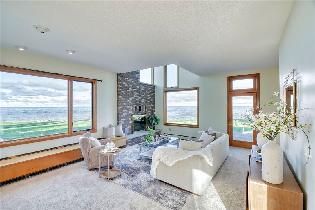 2609 Lake Road Ontario, NY 14519 - Photo 11 of 50 Sunken Family room with bench seating storage and