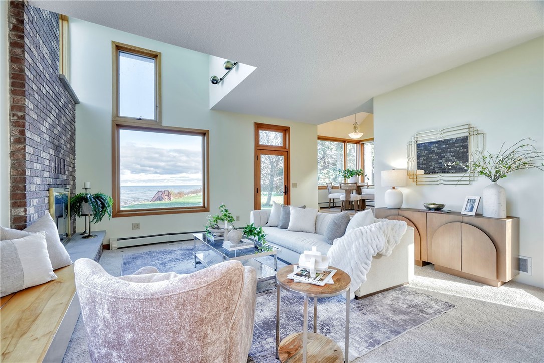 2609 Lake Road Ontario, NY 14519 - Photo 12 of 50 Sunken Family room with bench seating storage and