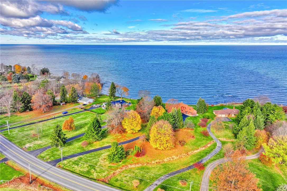 2609 Lake Road Ontario, NY 14519 - Photo 2 of 50 127' of prime Lake Ontario Frontage with reinforce