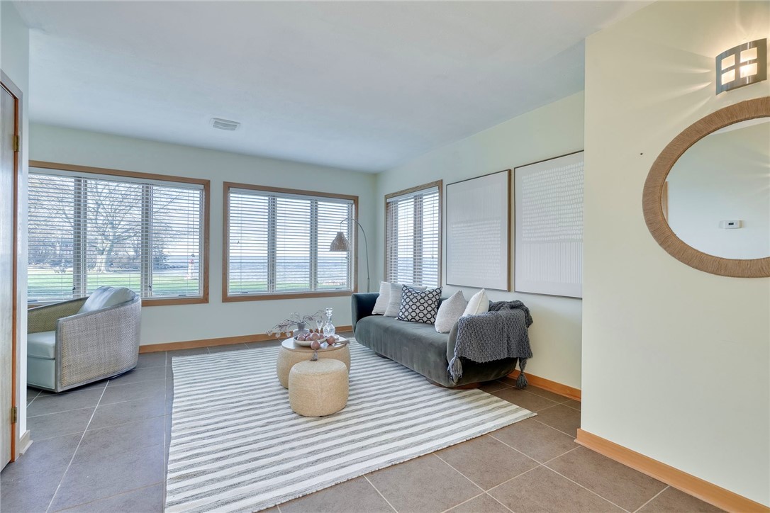 2609 Lake Road Ontario, NY 14519 - Photo 23 of 50 Foyer opens up to tiled bedroom/Den/office with wa