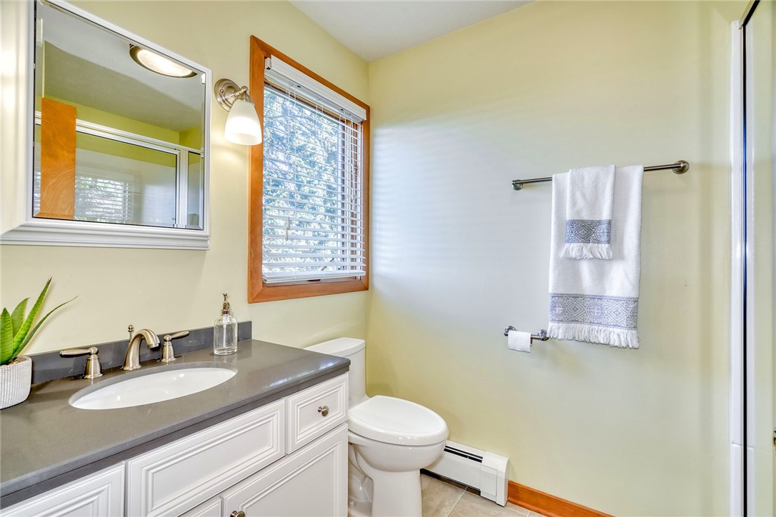 2609 Lake Road Ontario, NY 14519 - Photo 28 of 50 1st floor full bathroom with step in shower and up