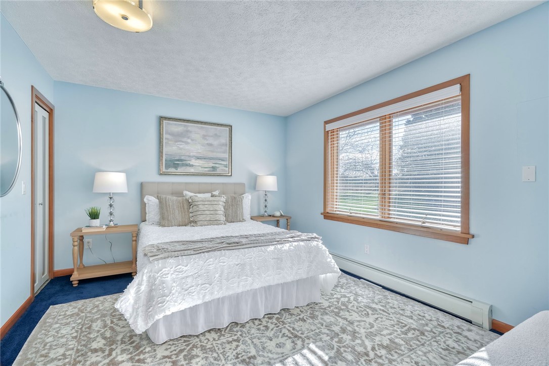 2609 Lake Road Ontario, NY 14519 - Photo 33 of 50 1st Floor Primary Bedroom with Ensuite!