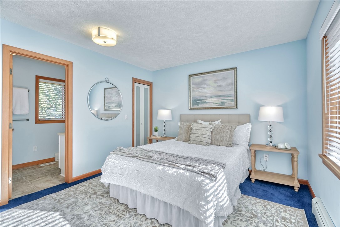 2609 Lake Road Ontario, NY 14519 - Photo 34 of 50 1st Floor Primary Bedroom with Ensuite!