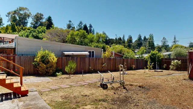 a view of a chairs and tables in the patio