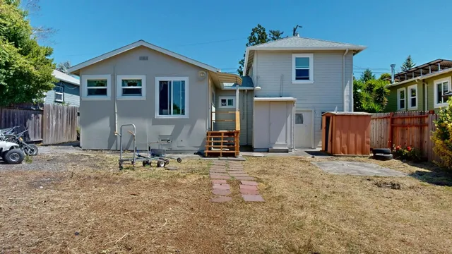 a front view of a house with a garage