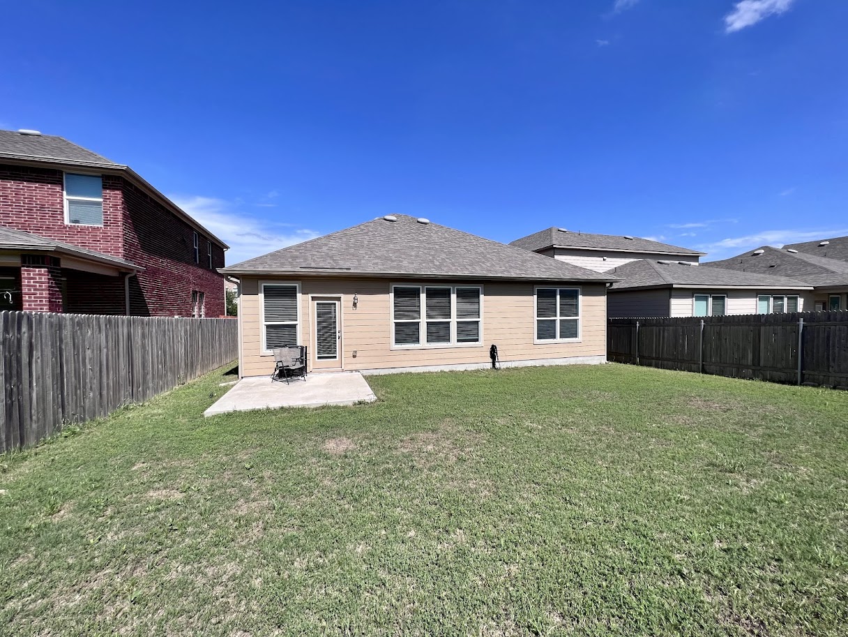 7900 Crystalbrook West Austin, TX 78724 - Photo 27 of 27 a view of a house with a yard and deck