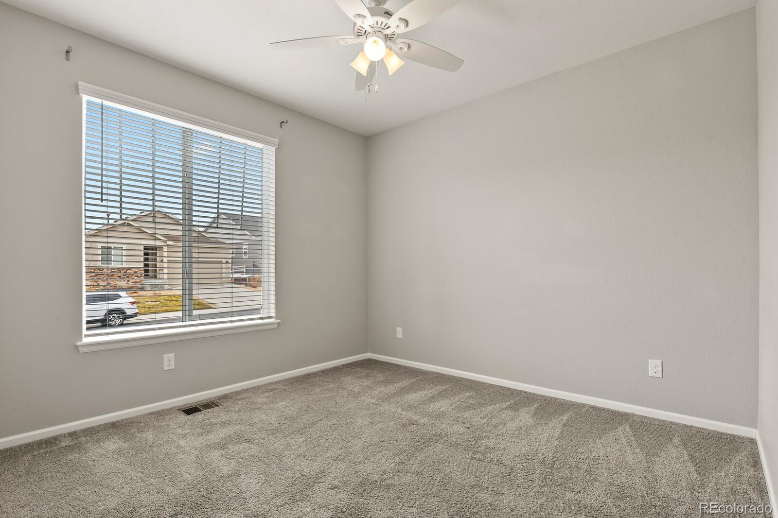 5723 Berry Ridge Wy. Castle Rock, CO 80104 - Photo 26 of 48 a view of an empty room with a window