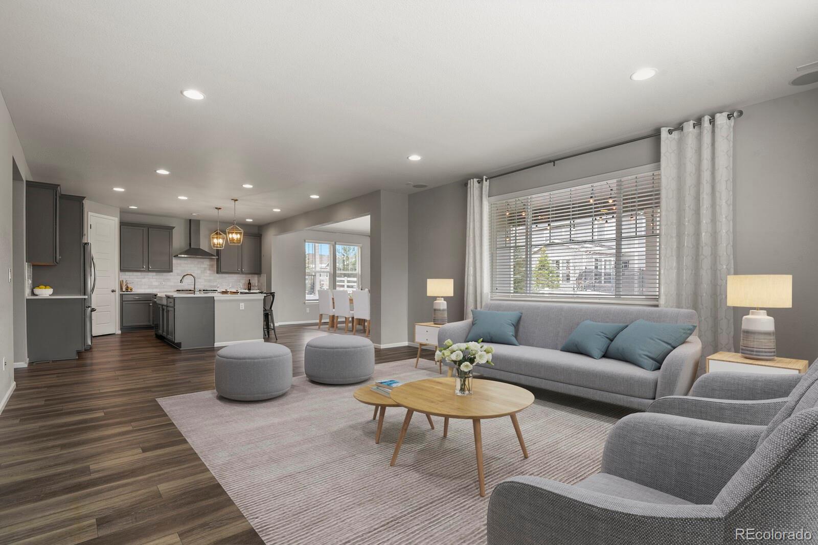 5723 Berry Ridge Wy. Castle Rock, CO 80104 - Photo 3 of 48 a living room with furniture kitchen and a table