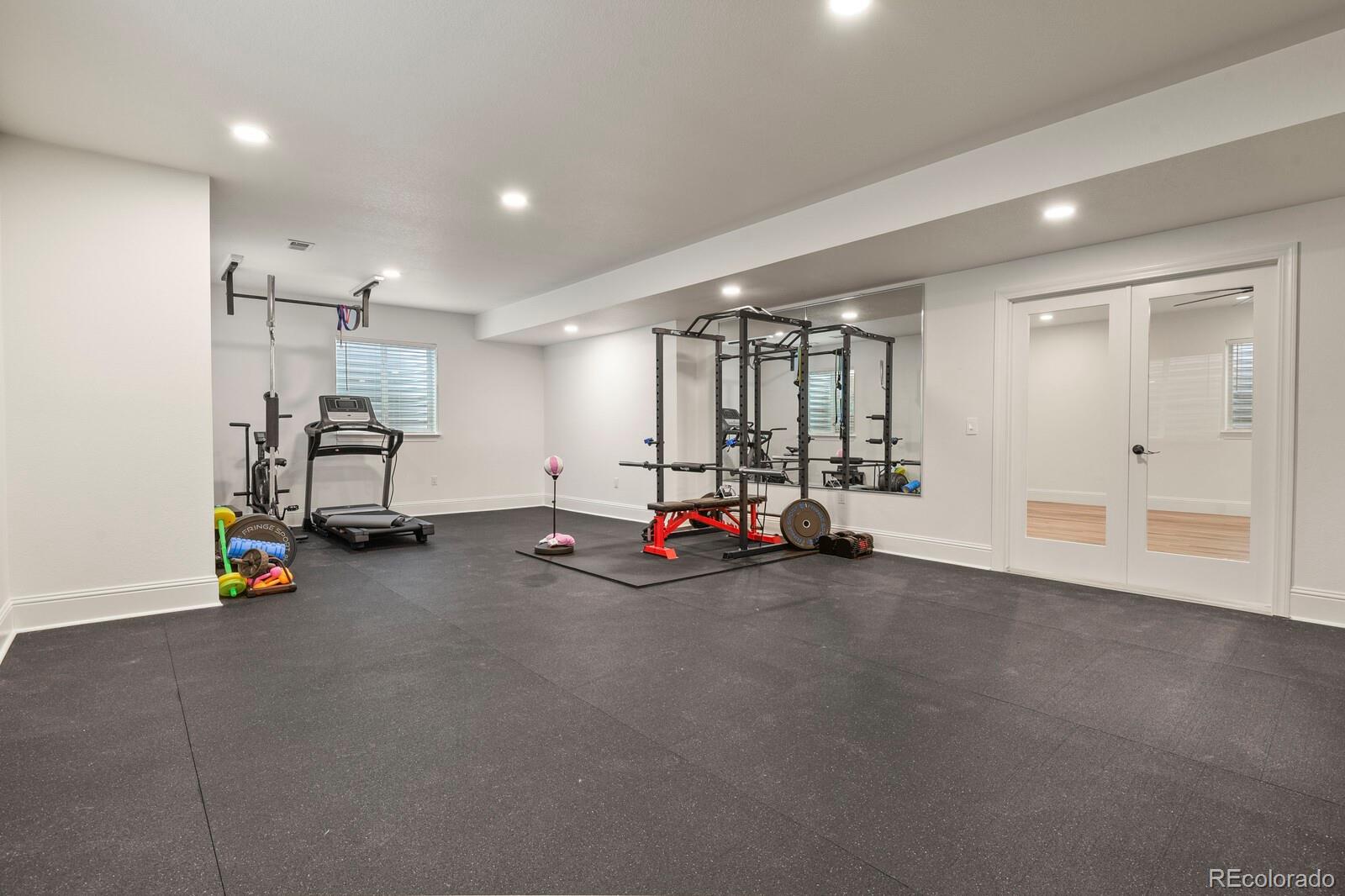 5723 Berry Ridge Wy. Castle Rock, CO 80104 - Photo 37 of 48 a view of a room with gym equipment