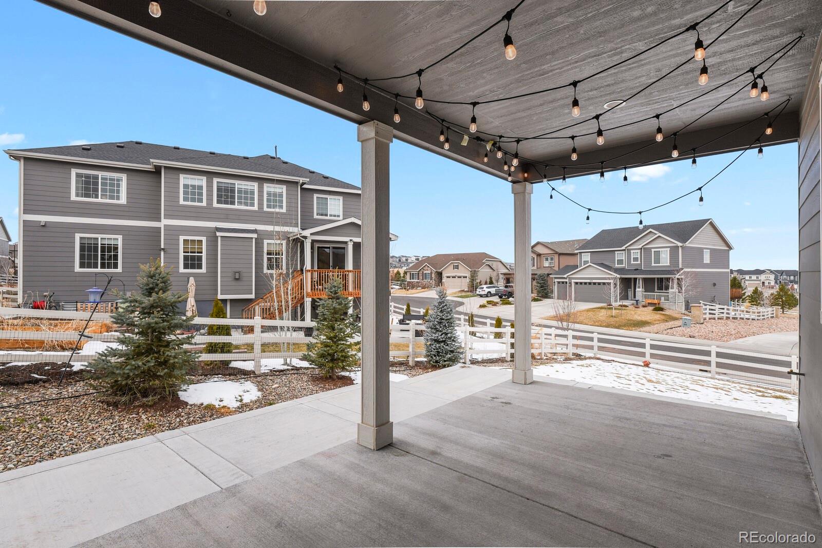 5723 Berry Ridge Wy. Castle Rock, CO 80104 - Photo 42 of 48 a view of a porch