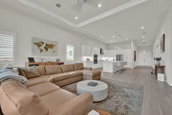 a living room with furniture and a view of living room