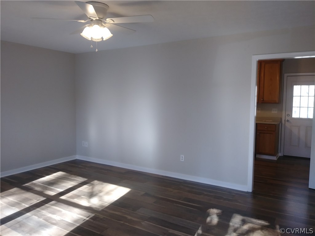 8320 Fredericks Hall Road Mineral, VA 23117 - Photo 6 of 39 an empty room with wooden floor and windows