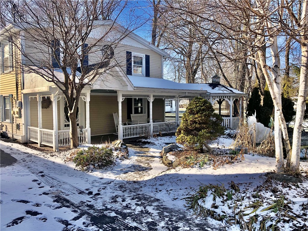 5940 Big Tree Road Livonia, NY 14480 - Photo 1 of 1 Pond side view of the main house.