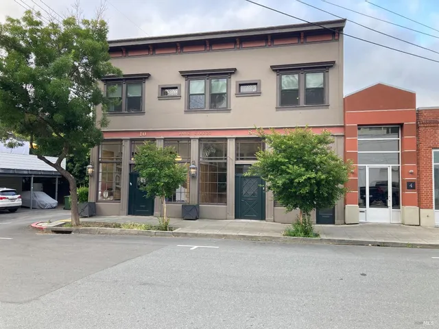a living room with furniture and decor