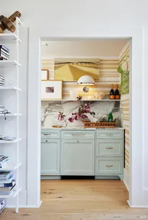 a living room with furniture fireplace and flat screen tv