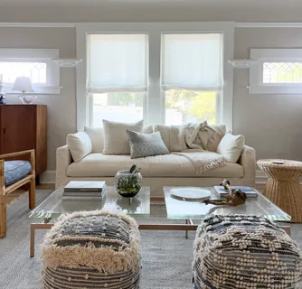a large white bed in a white room