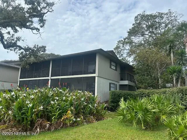 a backyard of a house with lots of green space