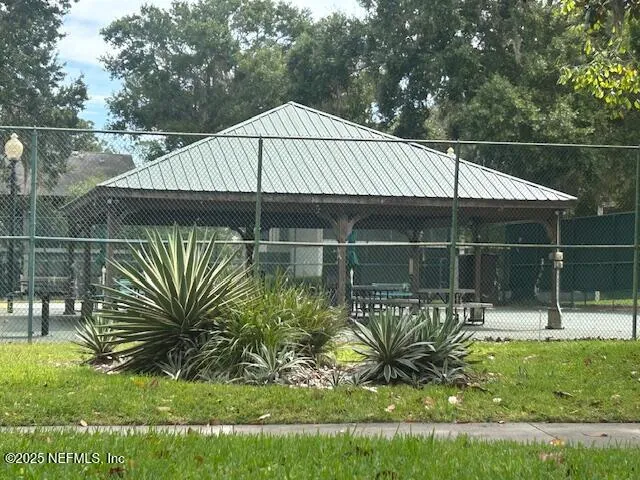 a house view with a garden space