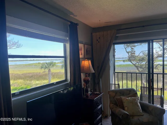 a living room with large window