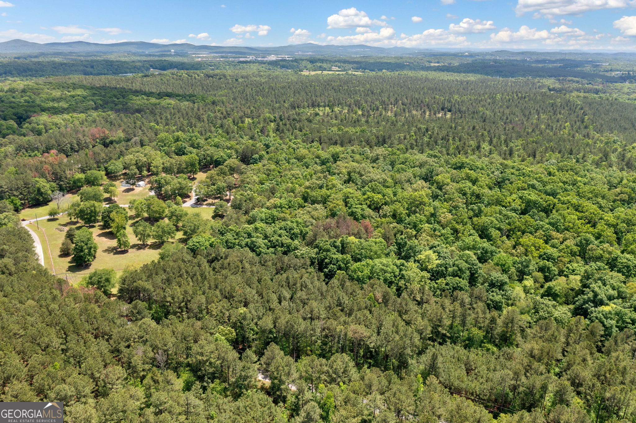 0 Timberwood Road Northwest, Unit 6 White, GA 30184 - Photo 23 of 26 a view of a lake from a yard