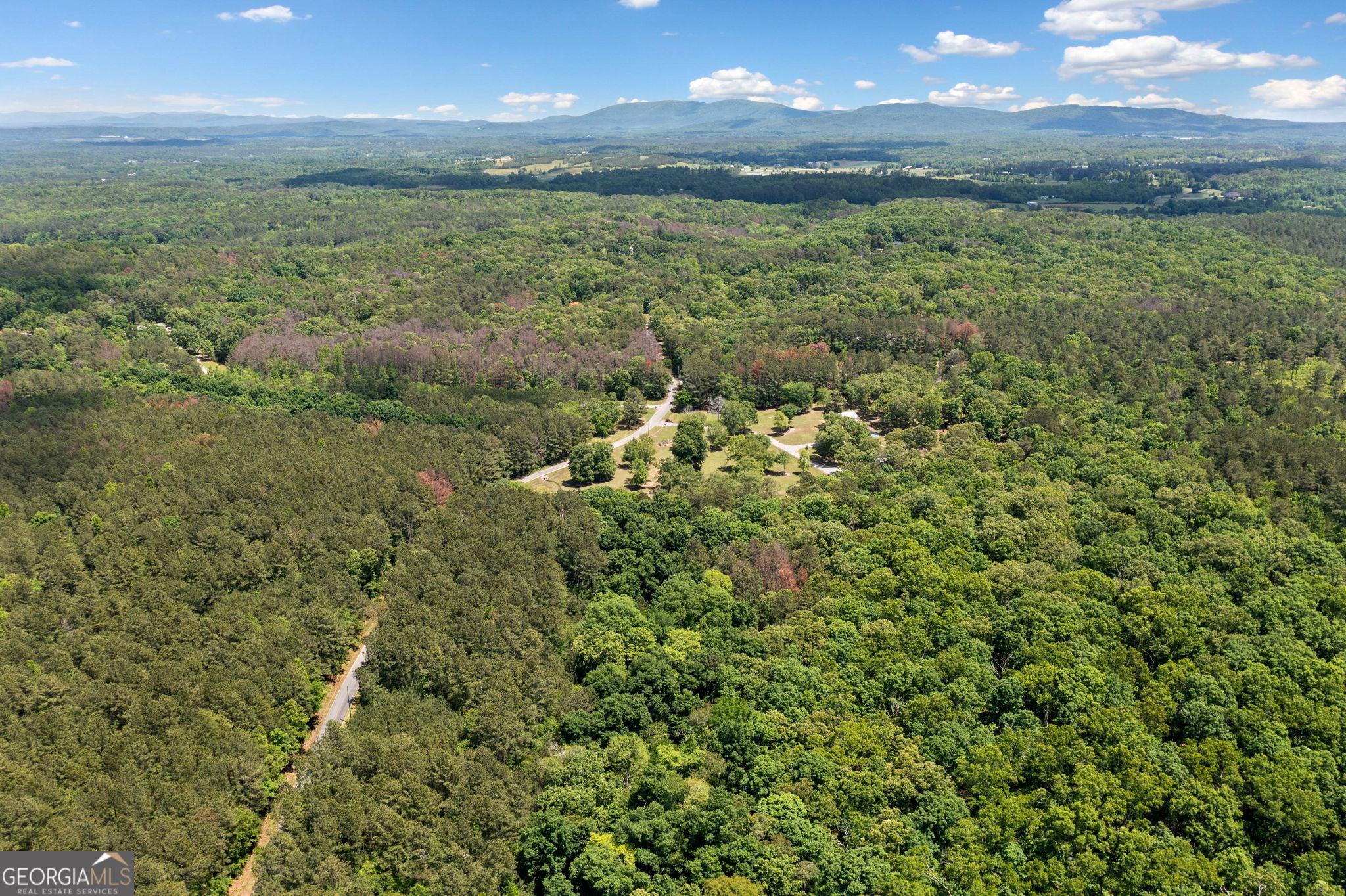 0 Timberwood Road Northwest, Unit 6 White, GA 30184 - Photo 10 of 26 a view of a green yard with an outdoor space