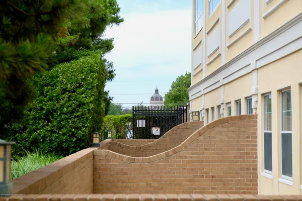 a view of a building with a yard