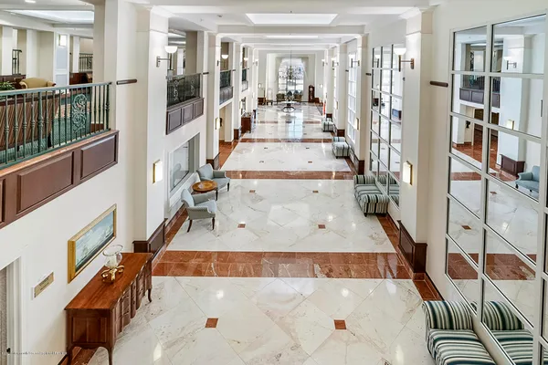 a view of living room with furniture and floor
