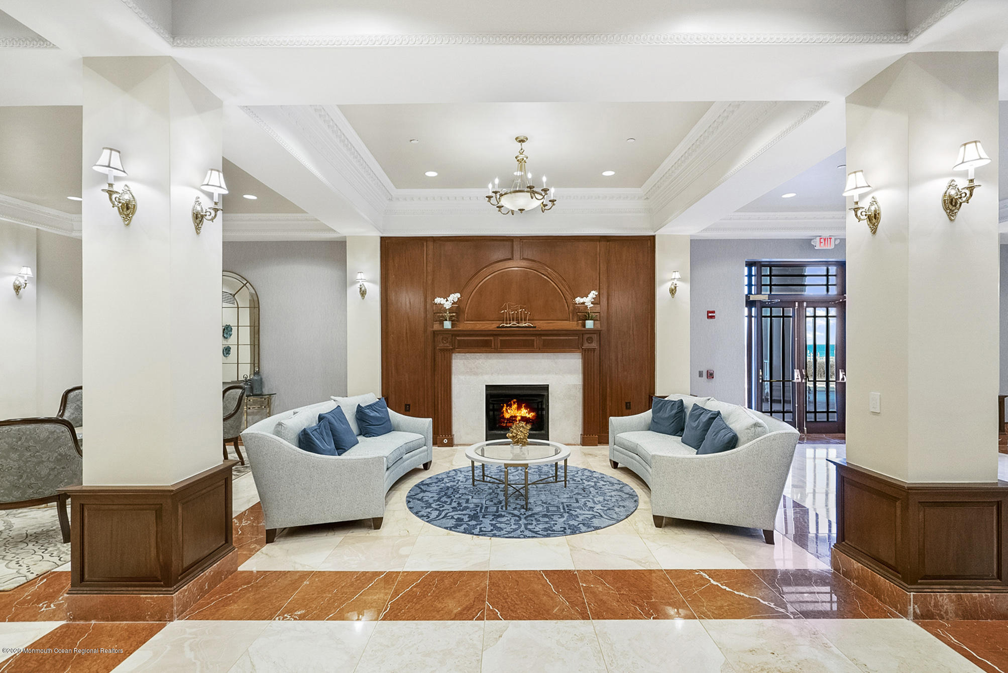 700 Ocean Avenue, Unit G1 Spring Lake, NJ 07762 - Photo 25 of 42 a living room with furniture and a fireplace