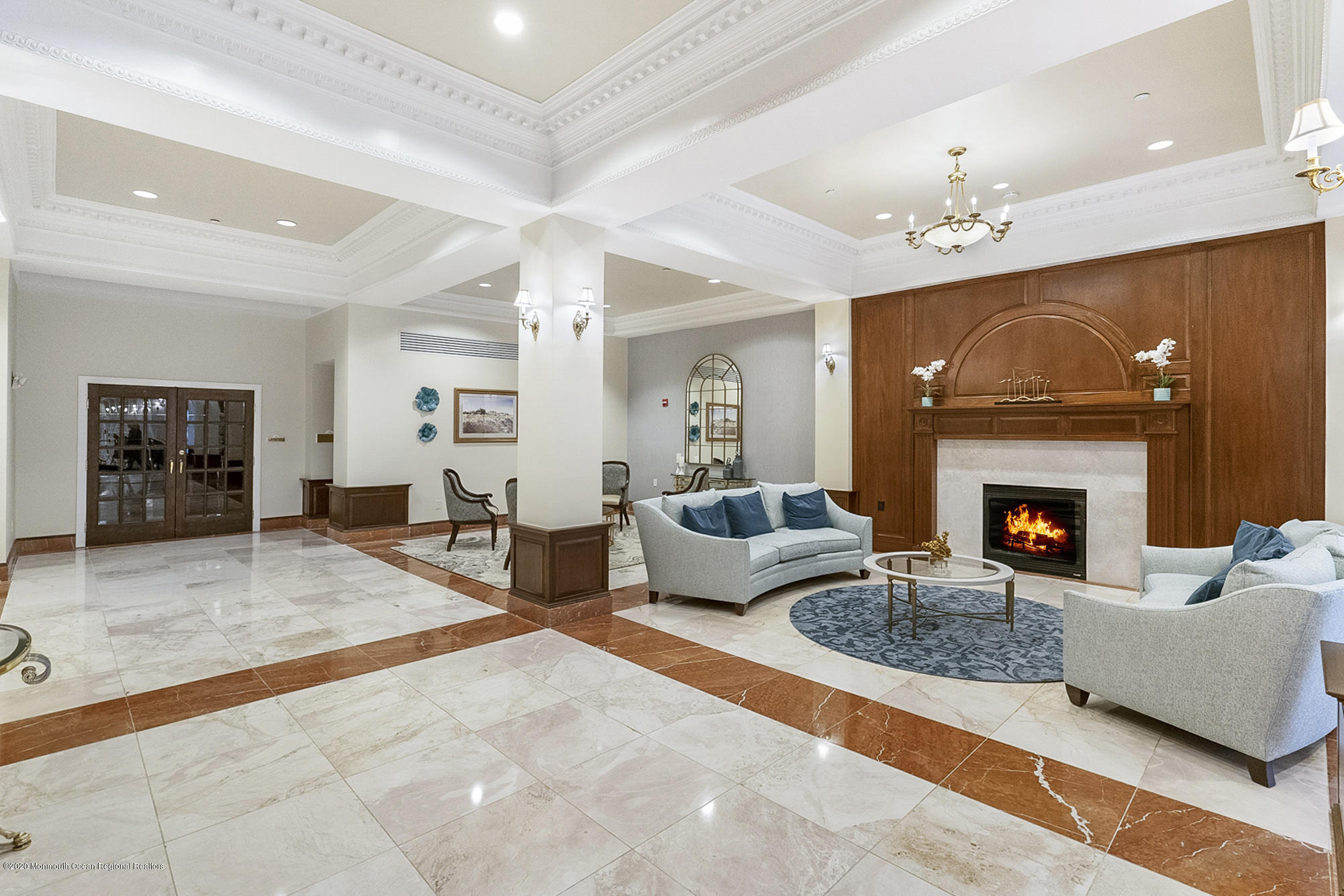 700 Ocean Avenue, Unit G1 Spring Lake, NJ 07762 - Photo 26 of 42 a living room with furniture and a fireplace