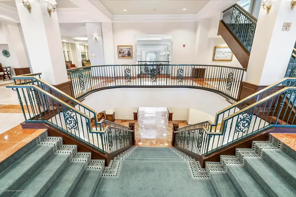 a view of staircase with lots of furniture and stairs