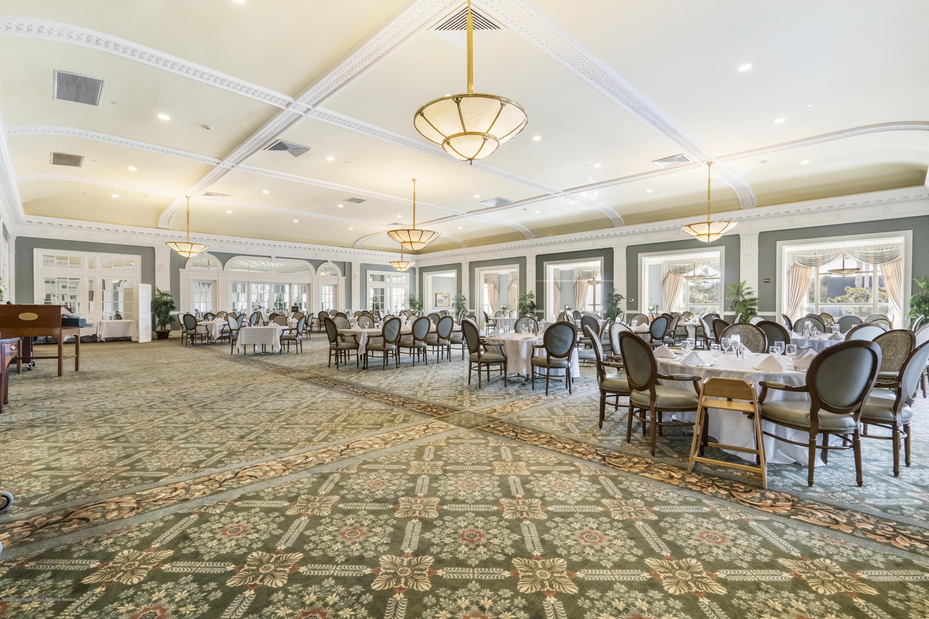 700 Ocean Avenue, Unit G1 Spring Lake, NJ 07762 - Photo 33 of 42 a view of a dining hall with lots of tables and chairs