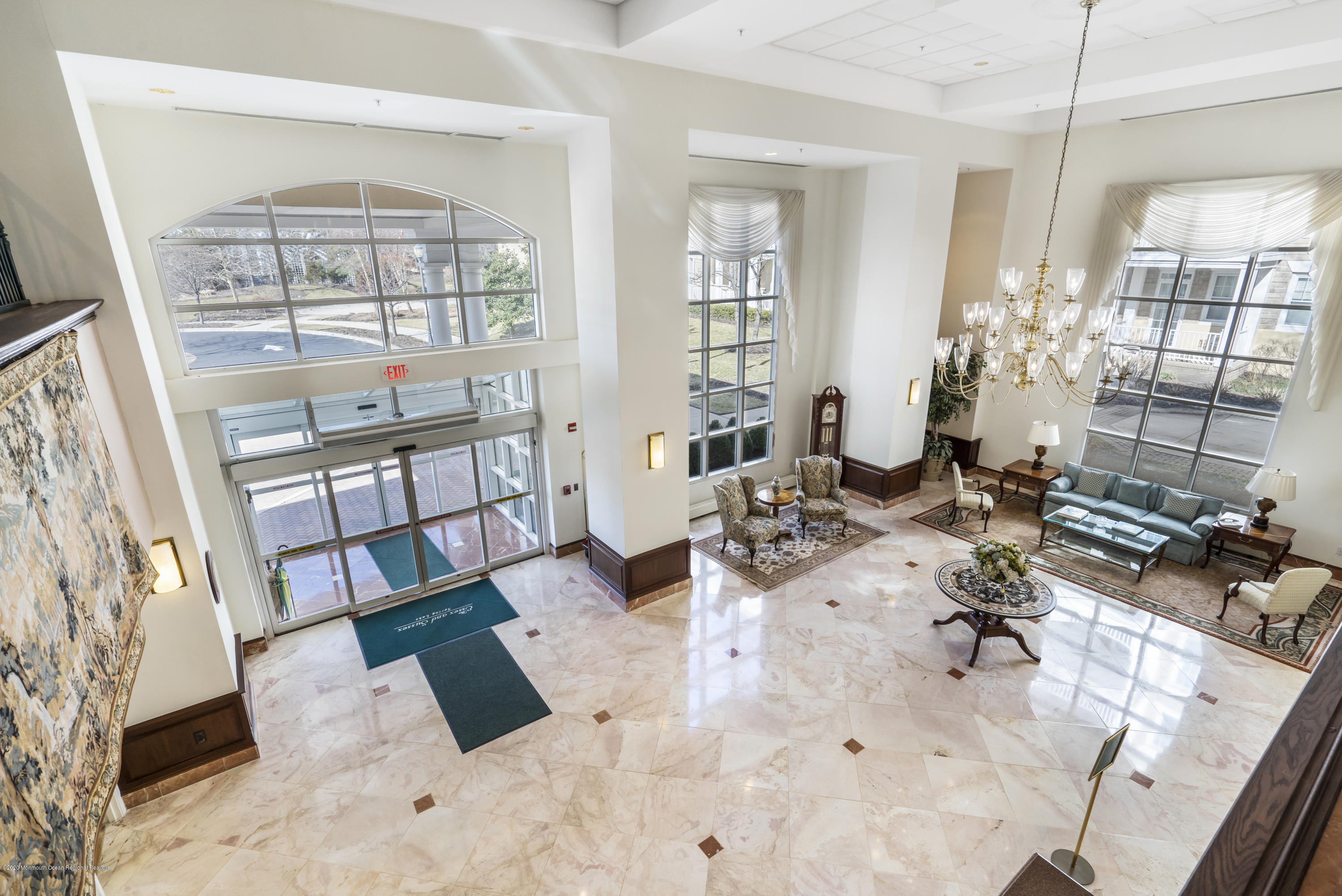700 Ocean Avenue, Unit G1 Spring Lake, NJ 07762 - Photo 36 of 42 a living room with furniture and a floor to ceiling window