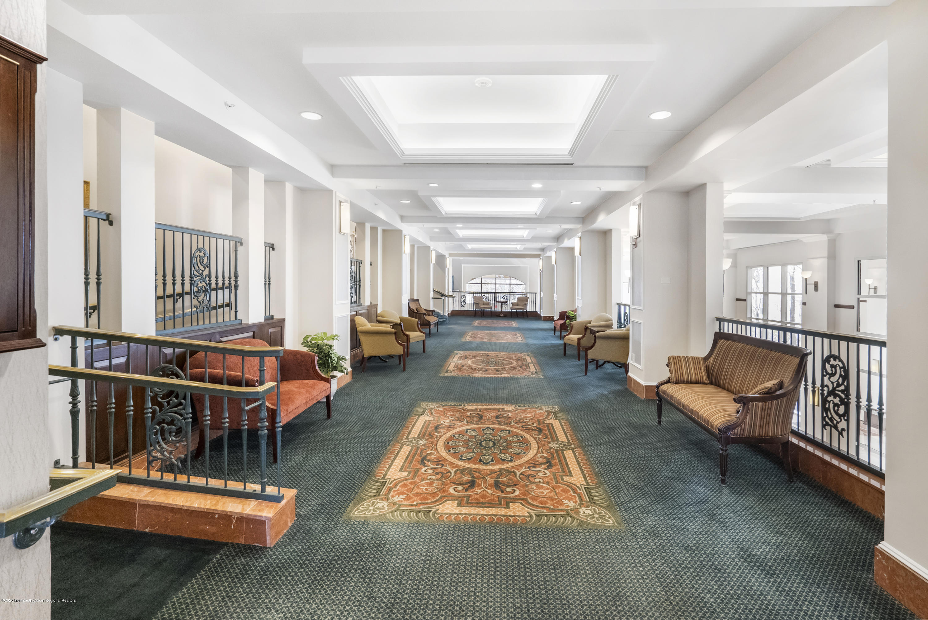 700 Ocean Avenue, Unit G1 Spring Lake, NJ 07762 - Photo 37 of 42 a living room with furniture pool table and a flat screen tv