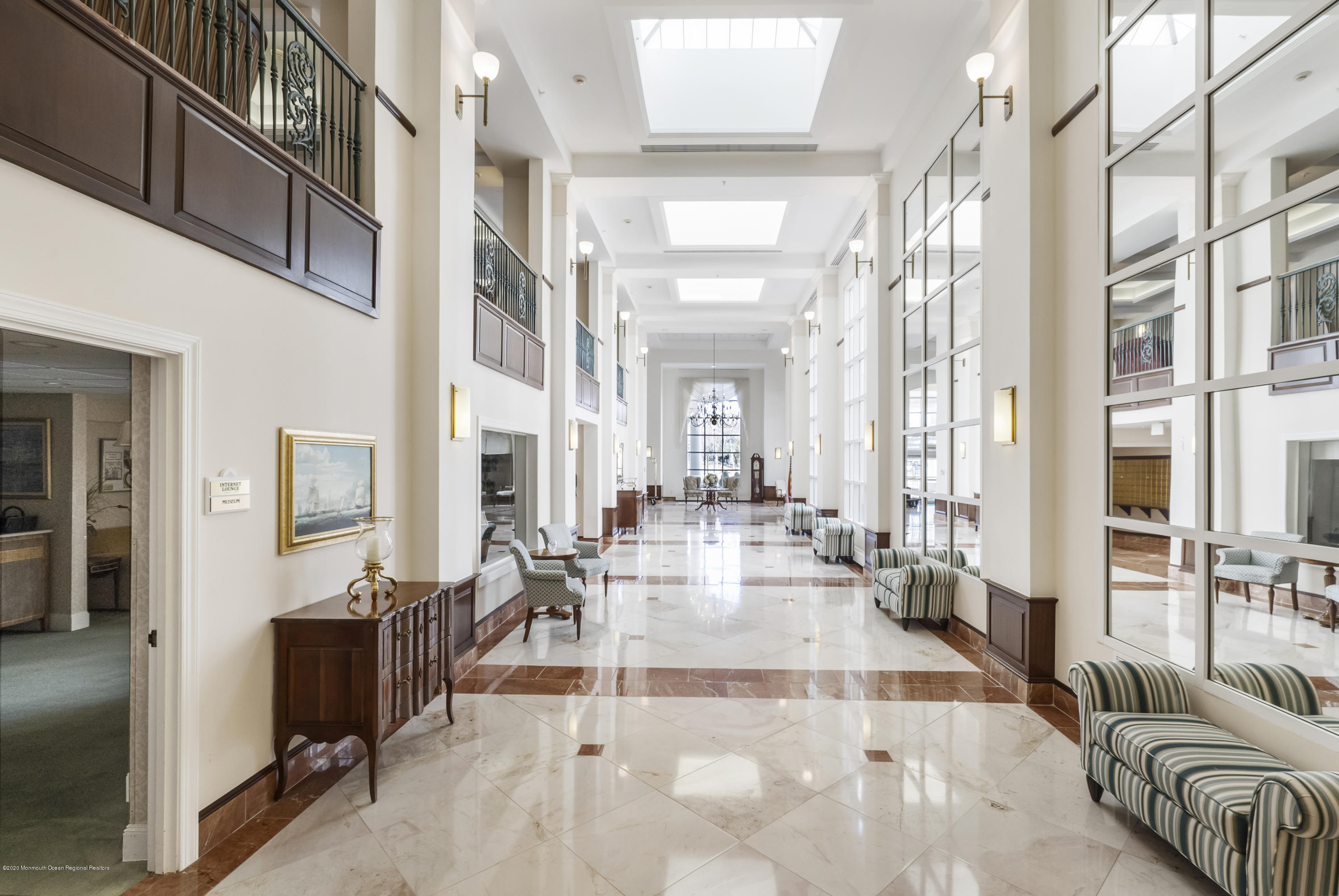 700 Ocean Avenue, Unit G1 Spring Lake, NJ 07762 - Photo 41 of 42 a living room with furniture and a table