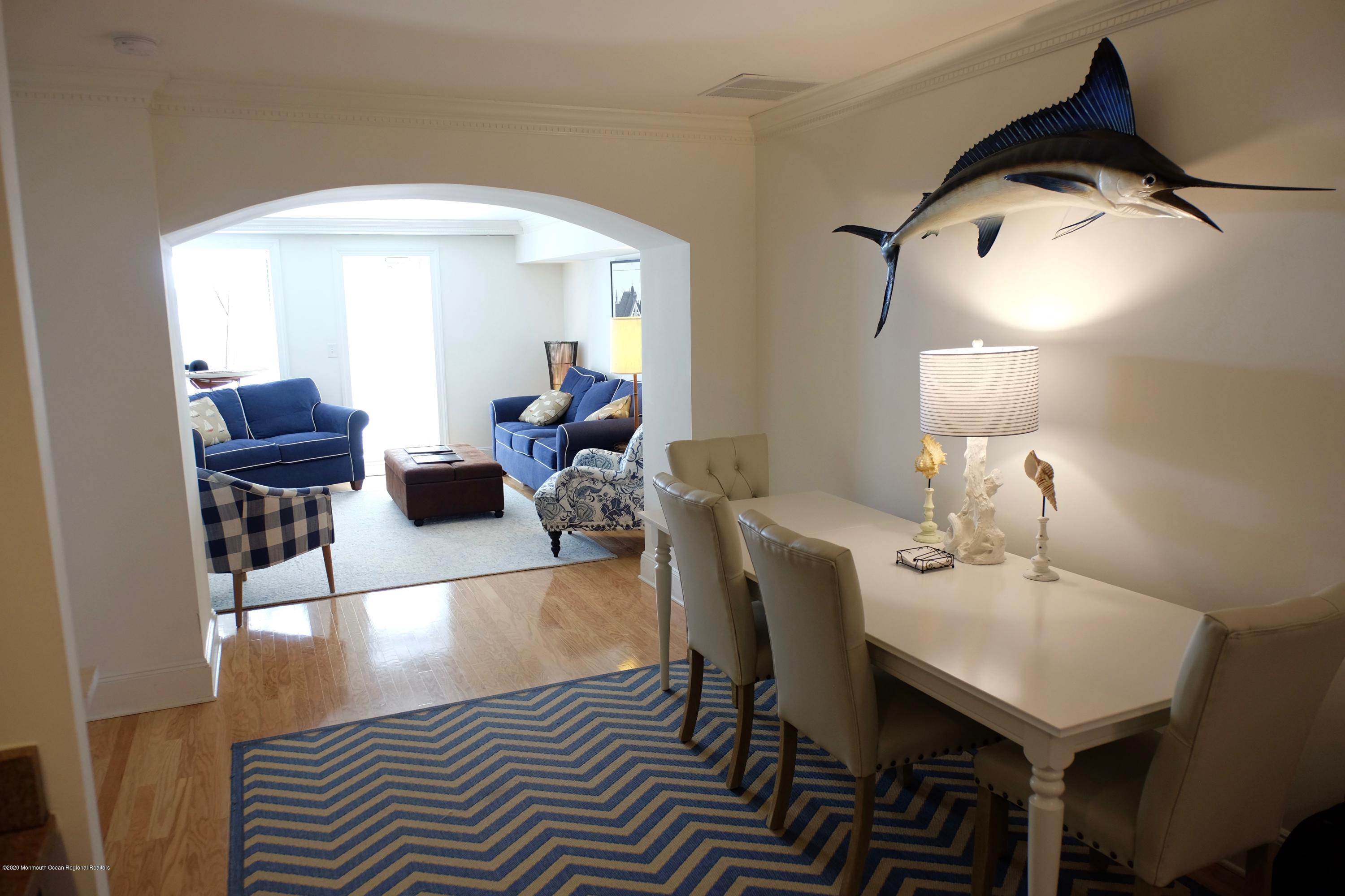 700 Ocean Avenue, Unit G1 Spring Lake, NJ 07762 - Photo 6 of 42 a living room with furniture