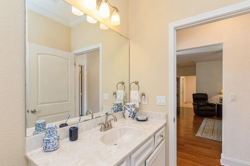 4647 Hermosa Road Crestview, FL 32539 - Photo 25 of 33 a bathroom with a sink vanity granite and a mirror