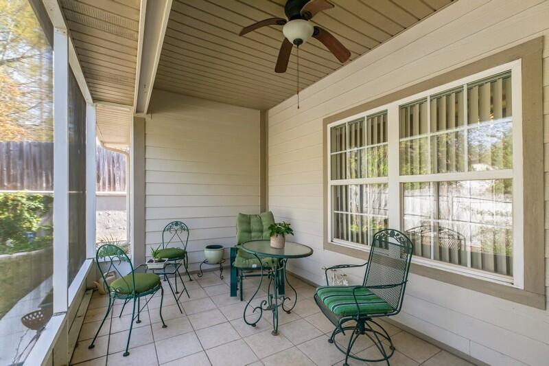 4647 Hermosa Road Crestview, FL 32539 - Photo 28 of 33 a view of a porch with chairs and potted plants