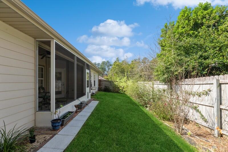 4647 Hermosa Road Crestview, FL 32539 - Photo 31 of 33 a view of a backyard with plants