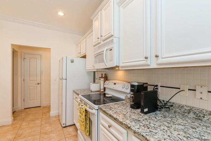 4647 Hermosa Road Crestview, FL 32539 - Photo 10 of 33 a kitchen with granite countertop a sink and a stove